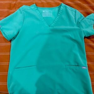 Figs medium jade top. GUC! Washed as instructed. Just too big for me now.